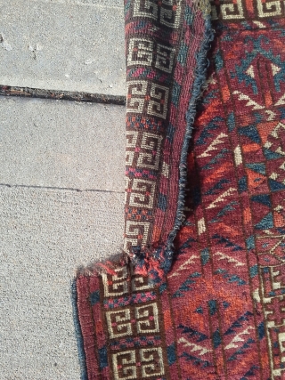Late 19th century Tekke 43"x 57". Pile is good, there are very minor moth damage in the field. See pix for other damage. Dyes look natural, asymmetrical knot.
     