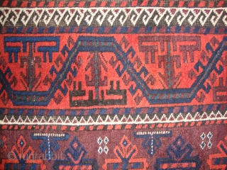 A Baluch rug, Circa 1900? Very good and original condition (see photos), Shiny wool, Not restored, All colours natural, Size: 210 x 100 cm.         