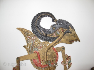 Four antique Indonesian shadow puppets, Circa 1900? Size: 70 cm. (27.5 inch) long.                    