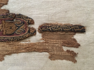 Coptic textile, polychrome wool and linen, 3rd the 6th . Century.
Mounted on linen stretcher 360mm x 230mm. Textile is about 10 inches top to bottom.
        