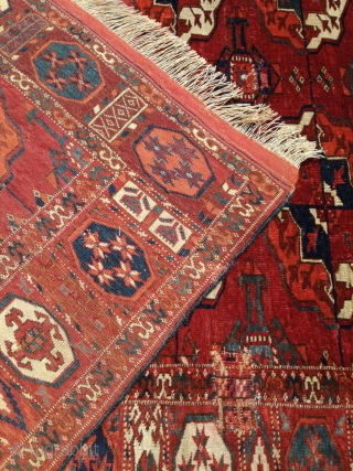 An antique Tekke main carpet  . 220/200 cm. Very old and Fine. Some repairs. Original size.                