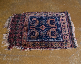 Antique Kurdish Rug. This is a west Persian Kurd with Four Peacocks. Very soft, hand-spun natural wool and old back. Ca 1880.

width:1'8"
length: 1'10"
size category: 3'x5' and smaller
dominant colors: Blue & Beige  