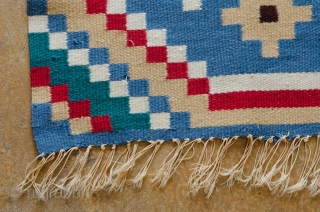 Swedish Rye Tapestry. This is a turn-of-the-last-century rye rug from Sweden, very cheerful and bright.

width: 1'7"
lenght: 1'9"
size category: 3'x5' and smaller
dominant colors: Blue, Red & Beige
       