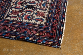 Antique Afshar. This is a fine Boteh Tribal Afshar. Very nice skirt with colorful chevrons.

width: 1'7"
length: 2'0"
size category: 3'x5' and smaller
dominant colors: Red, Blue & Beige       