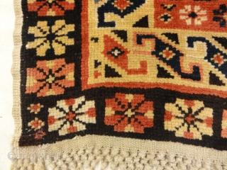 Antique  Caucasian rug, cotton foundation, with some cotton highlights, perfect condition with macrame ends.                  