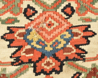 The Kurds of Senna produce kilim of very sophisticated construction. Their rugs have easily identifying characteristics : fields of repeating floral pattern, cotton warps and wool weft, very fine slitweave with extra  ...