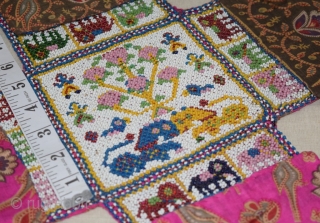 A unique and very fine Chaupar (Indian game, played with 4 players, somewhat like LUDO game), made from tiny glass beads intricately weave on cotton cloth, with Manchester printed cotton cloth behind.  ...