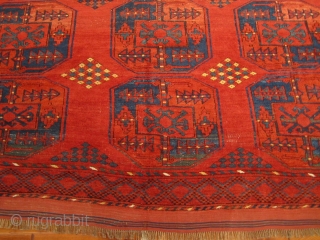 Antique Ersari, great red, nice yellows, blues, greens, burgandy. The rug is complete, but has some visible wear. Its a nice square size that measures 6'10'' x 8'6''Hard to photograph but the  ...