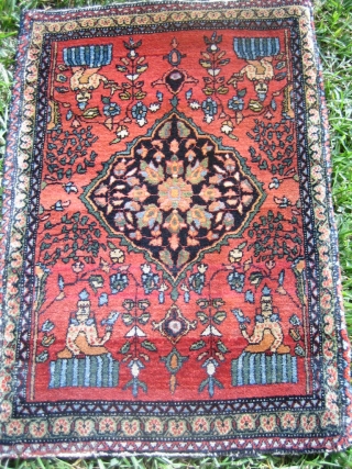  Antique Fereghan Sarouk with two different types of genies? In great original condition. This flying Persian carpet measures 1'9'' x 2'6''.           