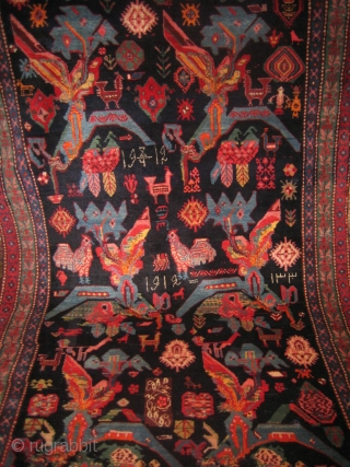 Triple dated Karabagh, maybe somebody's birthday? There foxes, llamas, donkeys, roosters, and there's even a person tending their samovar. Meaty condition its size is 5' x 8'9''.      