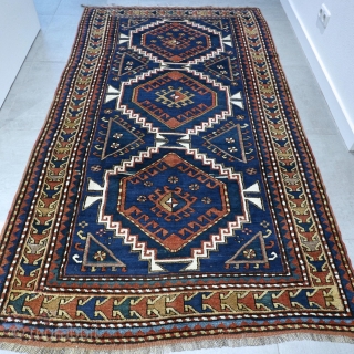 Antiqie Kazak rug. Late 1800s, early 1900s. Very good condition for it's age, light wear and wonderful pile. Wool on wool. Size approx. 7.3 x 4.2 FT / 221 x 129 cm.	 