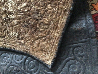 Kazakh leather saddle mat (tokym), leather, felt, hand stitching, 1900-1920, sizes: 50-125 cm.                    