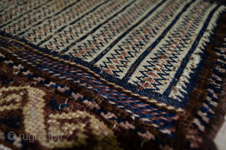 Fascinating antique Kelat bagface from Northeast of Iran.  This is a double technique weave with a very fine flat weave in the centre and piled technique on either end. There are  ...