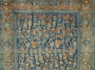 Stylish antique Malayer rug 202x127cm. An unusual royal blue background with all-over design and a paisley and flowerhead border with a change of colour at one end. It has soft shiny wool  ...