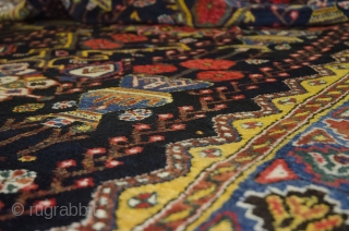 Remarkable antique Bakhtiar rug. 300x158cm, second half of 19th century. 

This is a rare piece woven on wool in very good condition with a wonderful triple medallion flanked with rows of flower  ...