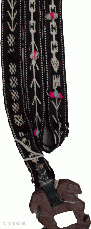 Charming antique Lori strap 490x5cm. This nomadic strap is used for tying-up loads that are put on a donkey or camel for transport. The strap is fed through the wooden lock at  ...