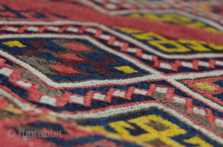 Magnificent antique Kordi kilim. Wonderful natural dyes and tribal designs with randomly placed “S” design. This is a khorjin that has been opened up and can also be used as a very  ...
