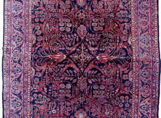 Antique Saruk Carpet 363x263cm  in good condition.

More info:https://sharafiandco.com/product/vintage-saruk-carpet-blue-field-with-swirling-floral-design-purple-border/
                        