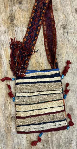 Old Afghan bag 49x28cm in good condition, with a very pretty strap.                     