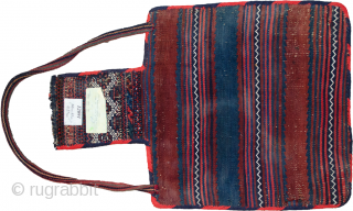 Very fine antique Kelat saltbag 60X45CM. This salt bag has had it’s edges rebound and the handle has been put in well after it had been woven.

MORE INFO: https://sharafiandco.com/product/antique-kelat-saltbag-60x45cm/
    