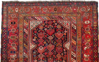 Antique Khamseh Carpet 353x180cm with vibrant colours and crisp drawing in good conditioin.

More info: https://sharafiandco.com/product/antique-khamseh-carpet-353x180cm/
                  