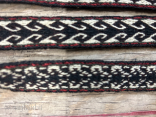 An impressive antique Qashqai narrow tent band. It seems to be for tying loads on camels and horses. The pom-poms at each end add so much charm to the piece and suggest  ...