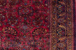 It is rare to find Lilihan carpets in such a big size. The deep red ground is decorated with an all-over bush design and a floral dark blue border. The colours are  ...