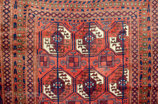 Unusual antique Baluch rug 217x130cm with a Turkman design woven on wool. The colour is mainly soft red with a beautiful shade of green in the border.  In generally good condition  ...