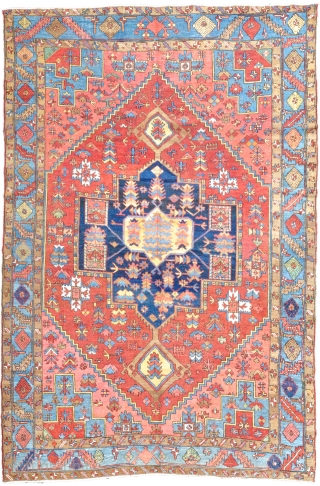 Antique Heriz Karaja 398x299cm. This piece has quite an unusual design for a Heriz or a Karaja carpet. The terracotta ground colour has a wonderful harmony with the blue and the peach  ...