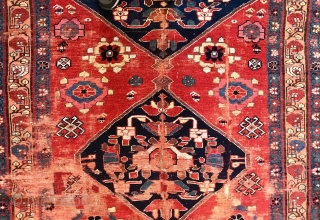 Old North west Persian rug with Minakhani references. Fabulous colors. Sporadic condition issues which shouldn’t bother serious collectors. Or a smart decorator. Or a regular person.       