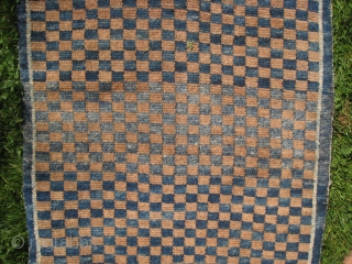 A Tibetan Checker Rug                             