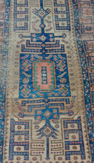 Approximately 4x7 Kurd Bijar type rug with Baluch sentiments.  Old money wear to go with it. Actual colors deeper than imaged.           