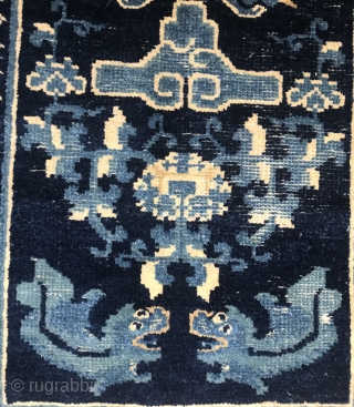 Small Chinese mat. Loss to top and bottom border. Low. Cheap (?). Trade for Baluch or turkoman fragment, with at least two major guls and presumably a minor ( unless it is  ...