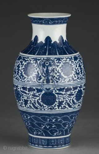 
a Chinese blue and white porcelain vase depicting lotus blossoms, having two elephant head handles , mark on the bottom. 12.25"H Circa - 19th Century or earlier .


Condition report

INTACT    