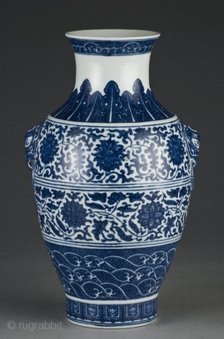 
a Chinese blue and white porcelain vase depicting lotus blossoms, having two elephant head handles , mark on the bottom. 12.25"H Circa - 19th Century or earlier .


Condition report

INTACT    