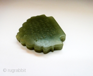 AN INSCRIBED NEPHRITE JADE TALISMANIC PENDANT WITH NUMERICAL WORDS 
PROBABLY IRAN, CIRCA 16TH CENTURY


2¼in. (6cm.) wide                 