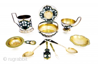 
A RUSSIAN SILVER ENAMEL TEA SET



A Russian Beautiful Enamel Silver Tea Set . Stamped , Marked , & signed Weight : 898.38 gm          