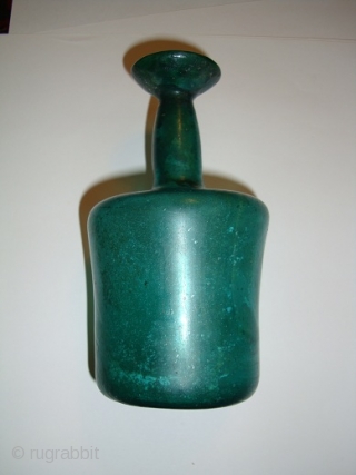 A Beautiful Persian Emerald Green Glass bottle 12 Century , Iran 


Condition Report : A minor crack around the neck otherwise INTACT

Measurement : 22 cm        