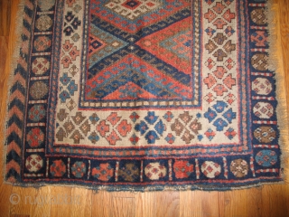 . Kurdish. It measures 2'5" x 3'6"  with some worn areas of low pile.                  