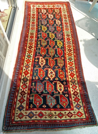 South Caucasian carpet, late 19th C. in very good condition, with only very minor breaks on the edges.  8'4" inches long x 3'5 wide(254cm x 104). Blue and brown field with  ...