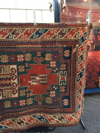 A very rare Karachove rug 122CM by 200CM Attractive colores edge about 120-140 years,it need good restoration it can be considered as a peace of art.       