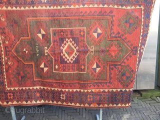 Old Fachralo Kazak rug with one Medellin of double head.
It has beautiful green field+warm colores.
Size 143cm x 200cm. it is in a good condition

Price €2750 including shipping and Ins.

Stephan Athir pages  