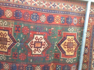 Old fachralo kazak rug with 3 medellin, attractive colores,with green field size 139cm x 205cm filled with art work.it can be use directly as a very rare fachralo after good cleaning or  ...