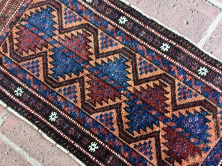 1' 4" x 2' 6" Baluch Balisht, having a rare "apricot" field                     