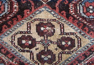 Antique 2' 10" x 13' 10" Kurd.  Lays straight; In low to medium pile condition, with the original end webbings having been sewn underneath. Two very small replied areas on one  ...