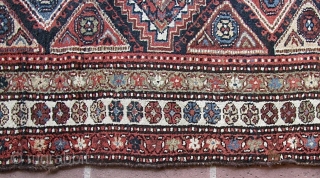 Antique 2' 10" x 13' 10" Kurd.  Lays straight; In low to medium pile condition, with the original end webbings having been sewn underneath. Two very small replied areas on one  ...