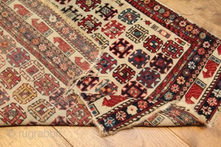 Marasali rug Late 19th Century with great colours on an ivory field.  Obviously more of a fragment due to missing quite a lot of borders on one side.  Has a  ...