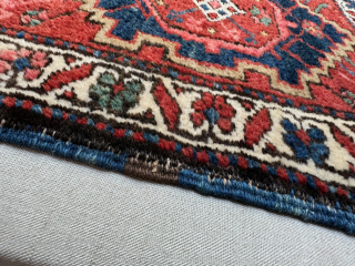 Antique Heriz bag face, circa 1900, that has been sewn onto a hessian wrapped wooden frame, which can be hung on a wall as a piece of rug art.

The size of the  ...