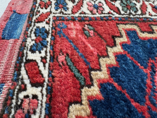 Antique Heriz bag face, circa 1900, that has been sewn onto a hessian wrapped wooden frame, which can be hung on a wall as a piece of rug art.

The size of the  ...