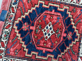 Antique Heriz bag face, circa 1900, that has been sewn onto a hessian wrapped wooden frame, which can be hung on a wall as a piece of rug art.

The size of the  ...